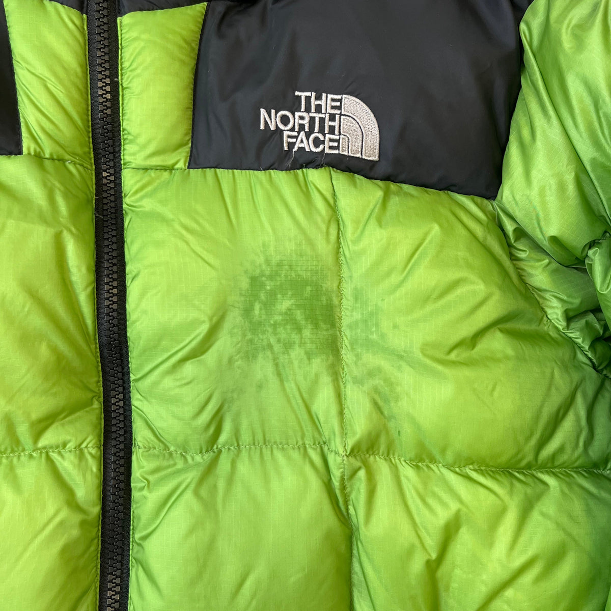 The North Face Green Lhotse Summit Series Puffer Jacket WITH STAIN