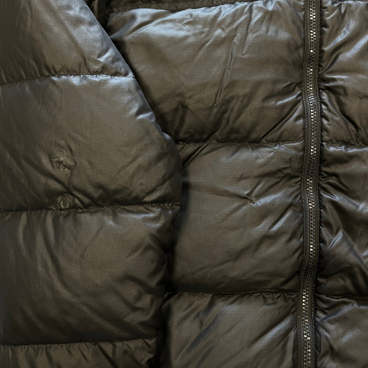The North Face Black Puffer Jacket WITH REPAIRS