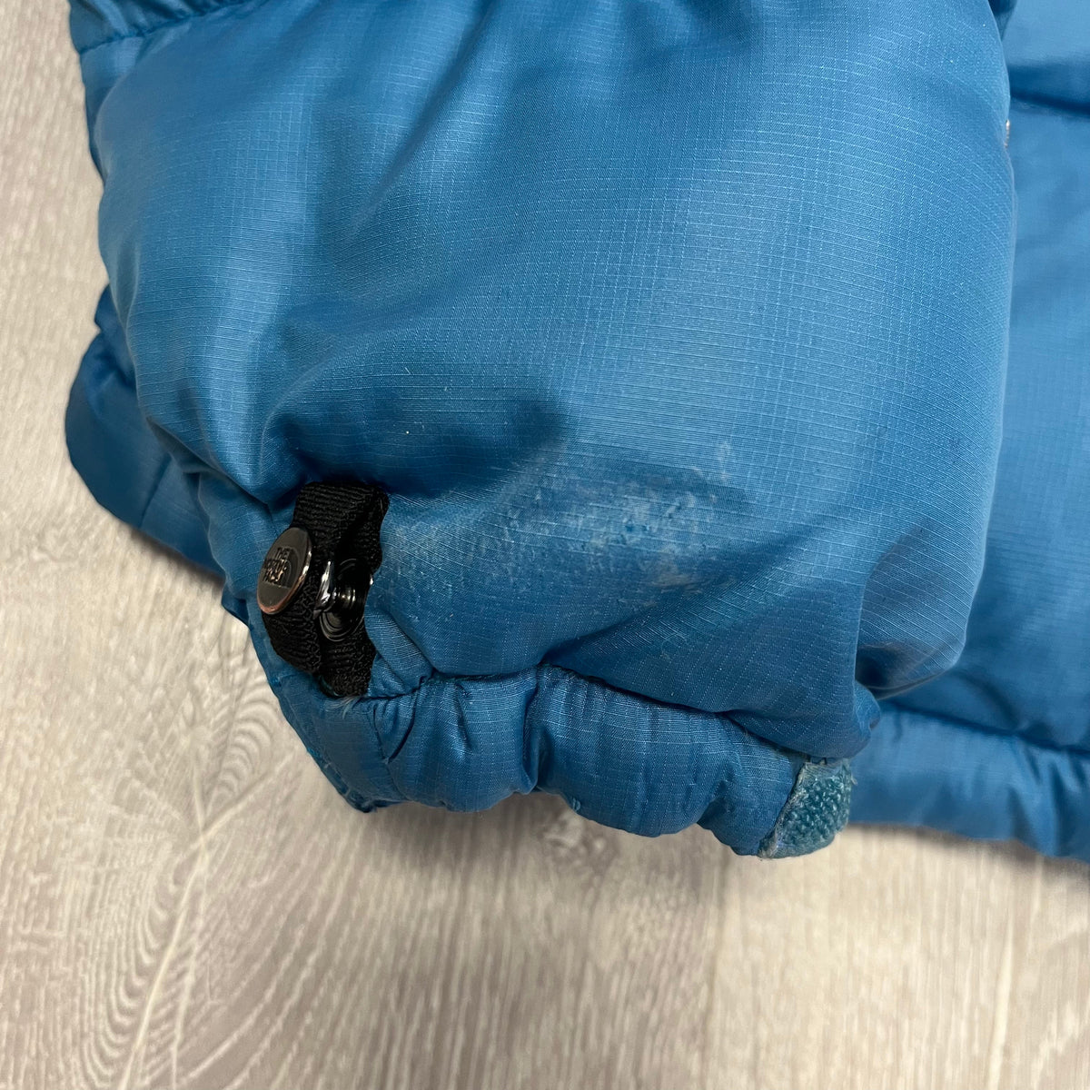 The North Face Baby Blue Puffer Jacket WITH MARK